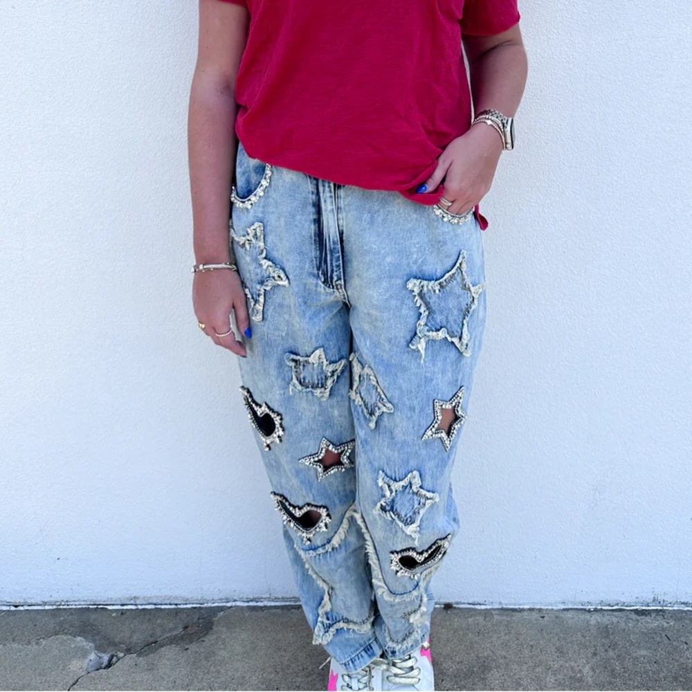 A RARE BIRD: Stars and hearts cutout bling jeans size small